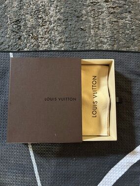 Louis Vuitton drawer style gift box accompanied by a matching dust bag